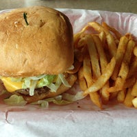 Photo taken at Moonies Burger House by Blanca U. on 4/2/2013