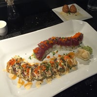 Photo taken at Pisces Sushi Global Bistro by Buck B. on 2/11/2015