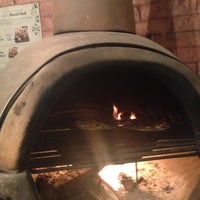 Photo taken at María Bigotes Pizzas a la leña by Kieb O. on 12/16/2014