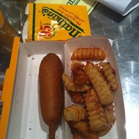 Photo taken at Nathan&amp;#39;s Famous by Miguel B. on 10/28/2012