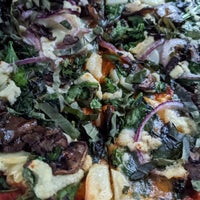 Photo taken at Hearth Artisan Pizza by Stello C. on 9/1/2022