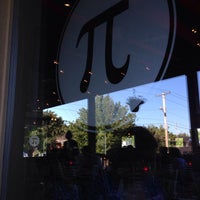 Photo taken at Pi Pizzeria by Travis M. on 7/24/2013