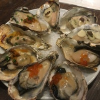 Photo taken at Oyster Table by ayumi n. on 8/30/2019