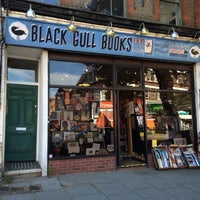 Photo taken at Black Gull Bookshop by J P. on 8/2/2015