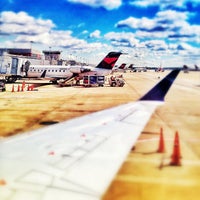 Photo taken at Gate C50 by Timothy M. on 4/5/2013