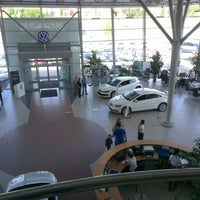 Photo taken at Volkswagen (Керг Уфа) by Денис А. on 5/25/2013