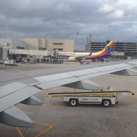 Photo taken at Gate H6 by Wilson Q. on 11/14/2013