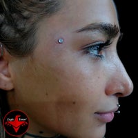 Photo taken at Eagle Tattoo by Cenk C. on 1/5/2022