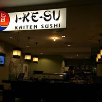 Photo taken at I-KE-SU Kaiten Sushi by Wolfgang K. on 12/17/2013