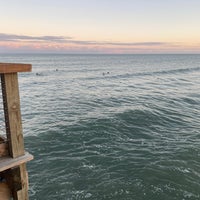 Photo taken at Cocoa Beach Pier by John G. on 12/8/2022