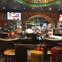 Photo taken at Red Robin Gourmet Burgers and Brews by Claudia F. on 5/21/2018