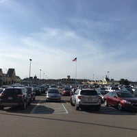 Photo taken at Tanger Outlet Howell by Carlos V. on 4/23/2016