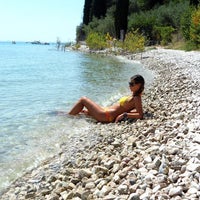 Photo taken at Baia delle Sirene by Lago di Garda on 4/25/2013