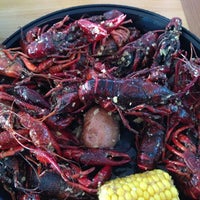 Photo taken at New LA Crawfish Boil Restaurant by Lauranoy T. on 6/12/2013
