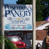 Photo taken at Poseidon&amp;#39;s Pantry Gourmet Grocery &amp;amp; Deli by Sean B. on 7/6/2014