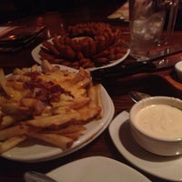 Photo taken at Outback Steakhouse by Mauro Silva G. on 4/28/2013
