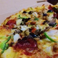 Photo taken at Domino&amp;#39;s Pizza by Mutiara S. on 12/15/2015