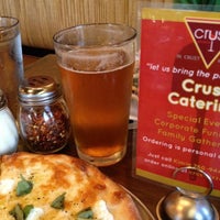 Photo taken at crust pizzeria by Brendan S. on 7/16/2013