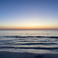 Photo taken at Coquina Beach by Grace K. on 12/13/2022