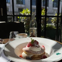 Photo taken at The Ivy Kensington Brasserie by Manal on 6/2/2024