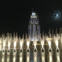 Photo taken at The Dubai Fountain by Guillermo R. on 4/25/2013