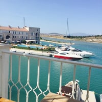 Photo taken at Port Alaçatı by Seyhan T. on 7/14/2015
