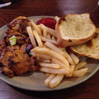 Photo taken at Nando&amp;#39;s by Peter J. on 7/5/2014