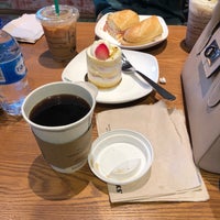 Photo taken at Starbucks by TOMY on 8/15/2019