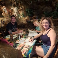 Photo taken at Rainforest Cafe by Rocio M. on 12/16/2022
