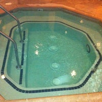Photo taken at Courtyard Hot Tub Time Machine by TBONE  P. on 11/24/2012