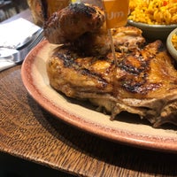 Photo taken at Nando&amp;#39;s by A on 4/4/2019