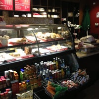 Photo taken at Starbucks by Sam B. on 12/26/2012