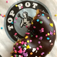 Photo taken at Top Pot Doughnuts by Miss N. on 4/21/2019