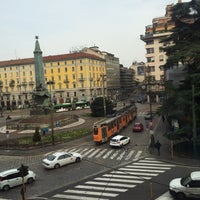 Photo taken at Piazza Cinque Giornate by Caloian I. on 3/8/2016