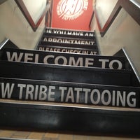 Photo taken at New Tribe Tattooing &amp;amp; Piercing by Antonia C. on 8/7/2013