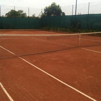 Photo taken at Quadra de Tenis - Cond. Clima Botânico by Michyele S. on 3/4/2014