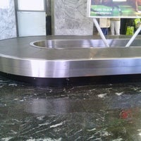 Photo taken at Baggage Claim Area by Anna B. on 7/19/2013