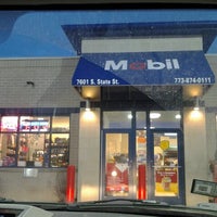 Photo taken at Mobil by Ced G. on 3/28/2013