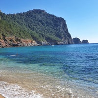 Photo taken at Cleopatra Beach by Mehmet Ö. on 3/15/2019