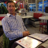 Photo taken at American City Diner by chris s. on 3/27/2014