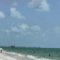 Photo taken at Naples Beach by Caroline R. on 7/22/2023