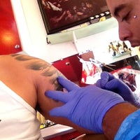 Photo taken at Hollywood Stars Tattoo by Ernie G. on 9/19/2012