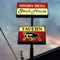 Photo taken at Angry Bull Steak House by Joe M. on 8/9/2015