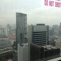 Photo taken at DBS Building Tower Two by J H. on 4/9/2013