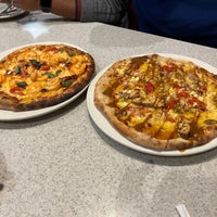 Photo taken at Brixx Wood Fired Pizza by Tarun K. on 1/4/2022