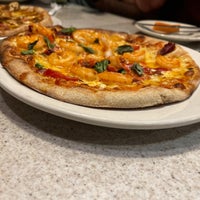 Photo taken at Brixx Wood Fired Pizza by Sreevarun N. on 1/4/2022