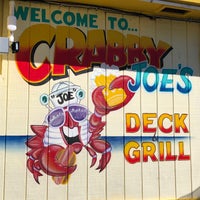 Photo taken at Crabby Joe&amp;#39;s Deck &amp;amp; Grill by Phil W. on 2/10/2022