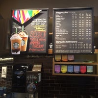 Photo taken at Starbucks (inside Urban Home) by Karen L. on 6/19/2015