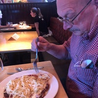 Photo taken at The Cheesecake Factory by Laura A. on 5/1/2021