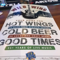 Photo taken at Wild Wing Cafe by Tom K. on 5/12/2018